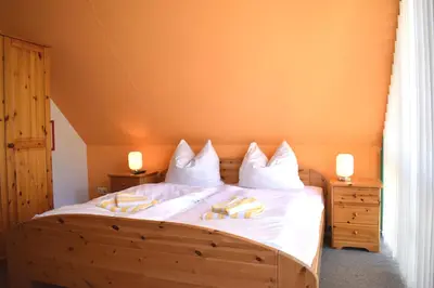Ein Bett oder Betten in einem Zimmer der Unterkunft Hinter den Dünen D77