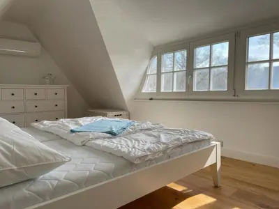 Ein Bett oder Betten in einem Zimmer der Unterkunft Haus 
