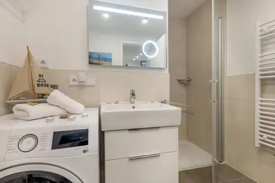 Ein Badezimmer in der Unterkunft Suite Lycka Zingst