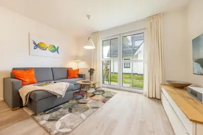 Ein Sitzbereich in der Unterkunft Suite Lycka Zingst