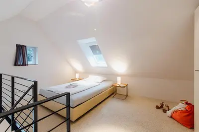 Ein Bett oder Betten in einem Zimmer der Unterkunft M2 Living Maisonette Apartment No 4