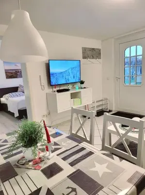 Ein Bett oder Betten in einem Zimmer der Unterkunft Haus Vineta