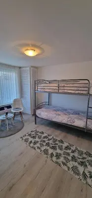 Ein Bett oder Betten in einem Zimmer der Unterkunft Haus Vineta
