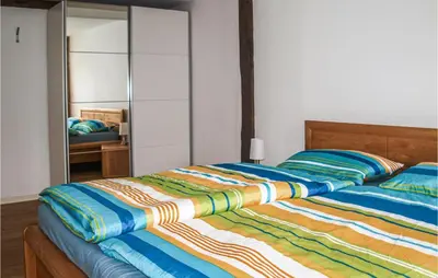 Ein Bett oder Betten in einem Zimmer der Unterkunft Fewo Albrechtshof