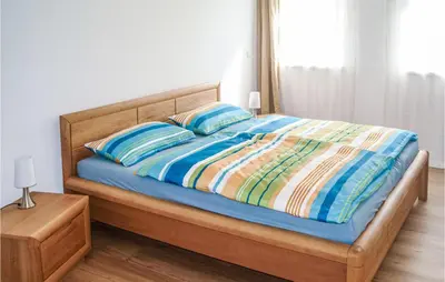Ein Bett oder Betten in einem Zimmer der Unterkunft Fewo Albrechtshof