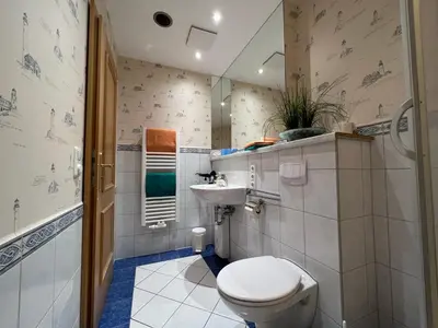 Ein Badezimmer in der Unterkunft Ferienhaus Brise - Matrosenstube