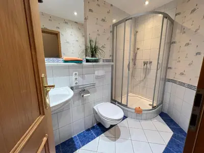 Ein Badezimmer in der Unterkunft Ferienhaus Brise - Matrosenstube