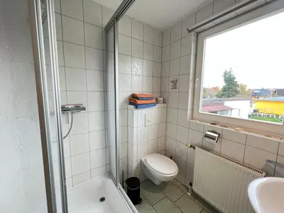 Ein Badezimmer in der Unterkunft Ferienhaus Brise - Austernperle