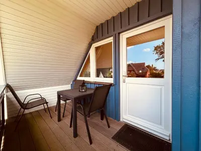 Ein Balkon oder eine Terrasse in der Unterkunft Ferienhaus Brise - Austernperle