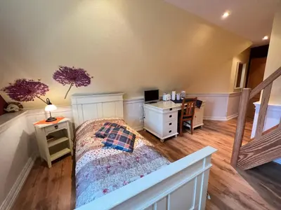 Ein Bett oder Betten in einem Zimmer der Unterkunft Ferienhaus Brise - Singletörn