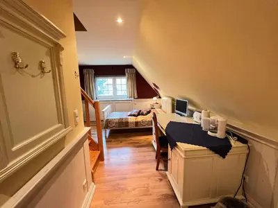 Ein Bett oder Betten in einem Zimmer der Unterkunft Ferienhaus Brise - Singletörn