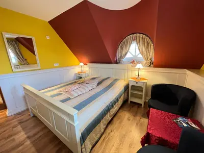 Ein Bett oder Betten in einem Zimmer der Unterkunft Ferienhaus Brise - Skipper's Kabine