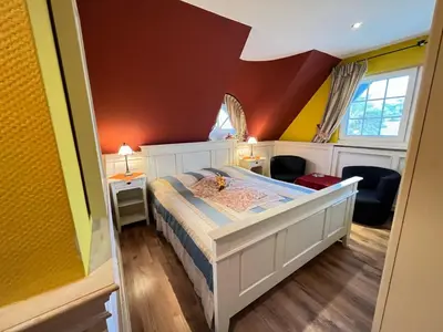Ein Bett oder Betten in einem Zimmer der Unterkunft Ferienhaus Brise - Skipper's Kabine
