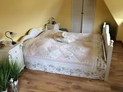 Ein Bett oder Betten in einem Zimmer der Unterkunft Ferienhaus Brise - Schmugglerhus