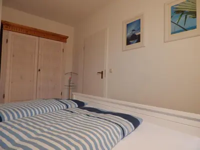 Ein Bett oder Betten in einem Zimmer der Unterkunft Birkenstr 14 Wg 15 