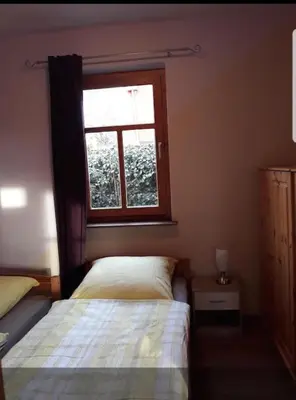 Ein Bett oder Betten in einem Zimmer der Unterkunft Haus Abendsonne