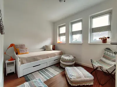 Ein Bett oder Betten in einem Zimmer der Unterkunft Ferienhaus Zur Oie