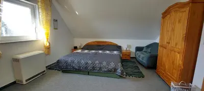 Ein Bett oder Betten in einem Zimmer der Unterkunft Adonis