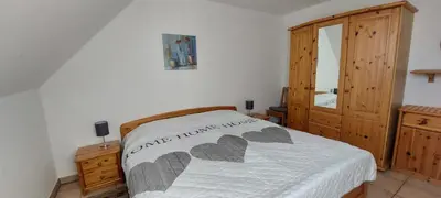 Ein Bett oder Betten in einem Zimmer der Unterkunft Adonis