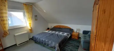 Ein Bett oder Betten in einem Zimmer der Unterkunft Adonis