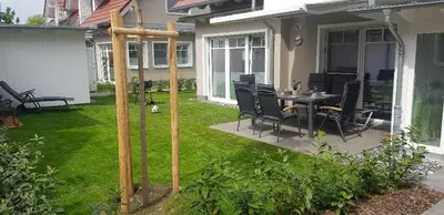 Ein Garten an der Unterkunft FeWo Ferienwelle