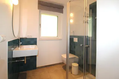 Ein Badezimmer in der Unterkunft Bungalow Schifferberg Lodge