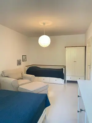 Ein Bett oder Betten in einem Zimmer der Unterkunft Fe-Wo Schifferberg Lodge