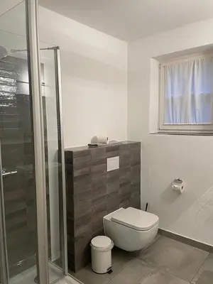 Ein Badezimmer in der Unterkunft Fe-Wo Schifferberg Lodge