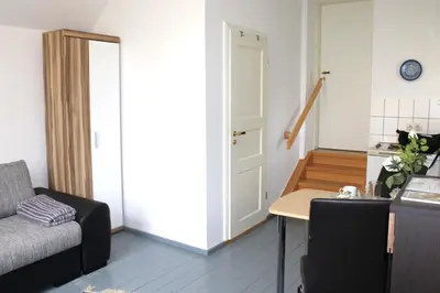 Ein Sitzbereich in der Unterkunft Haus Koppelweg FW-Muschel