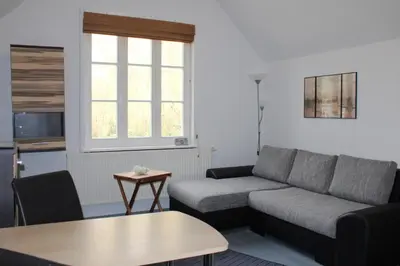 Ein Sitzbereich in der Unterkunft Haus Koppelweg FW-Muschel