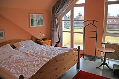 Ein Bett oder Betten in einem Zimmer der Unterkunft Min Lütt
