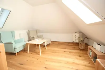 Ein Sitzbereich in der Unterkunft Haus Sprotte