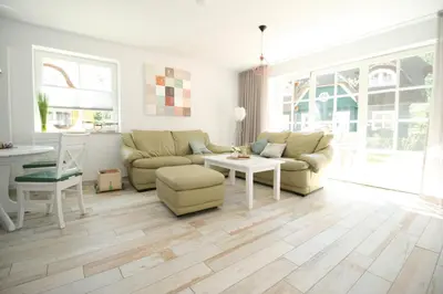 Ein Sitzbereich in der Unterkunft Haus Sprotte