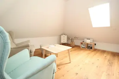 Ein Sitzbereich in der Unterkunft Haus Sprotte
