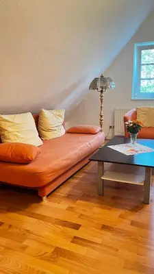Ein Sitzbereich in der Unterkunft Unterm Rohrdach