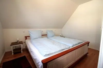 Ein Bett oder Betten in einem Zimmer der Unterkunft Wohnung-Salzaster