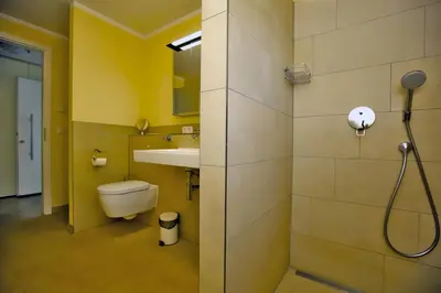Ein Badezimmer in der Unterkunft Ostseetraum 03 - Aquamarin