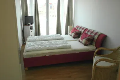 Ein Bett oder Betten in einem Zimmer der Unterkunft Wildrose FW 2