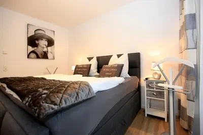 Ein Bett oder Betten in einem Zimmer der Unterkunft Ferienwohnung Bickbeeren C2