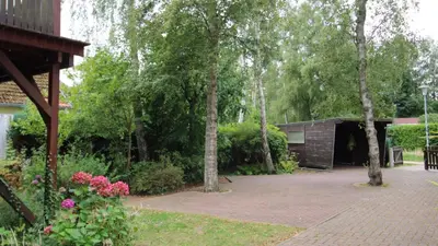 Ein Garten an der Unterkunft Hus Sünnschien FW1