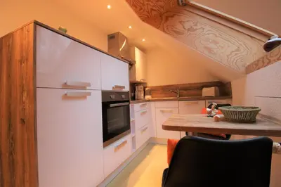 Küche/Küchenzeile in der Unterkunft Hus Sünnschien FW2