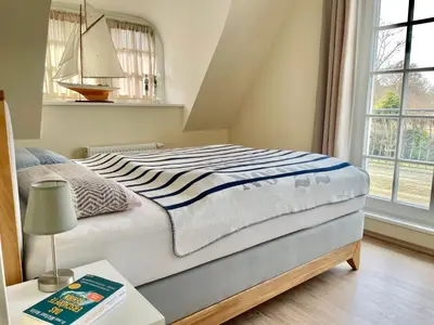 Ein Bett oder Betten in einem Zimmer der Unterkunft Haus Glücksanker