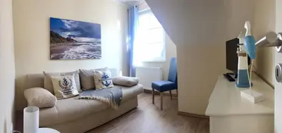 Ein Sitzbereich in der Unterkunft Haus Glücksanker