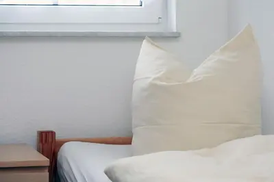 Ein Bett oder Betten in einem Zimmer der Unterkunft Haus Sanddorn Hooghass FW4