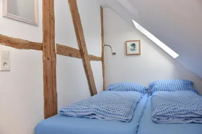 Ein Bett oder Betten in einem Zimmer der Unterkunft Haus Reuter 