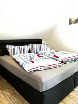 Ein Bett oder Betten in einem Zimmer der Unterkunft Lotte's lütte Stuv