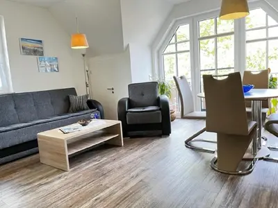 Ein Sitzbereich in der Unterkunft Lotte's lütte Stuv