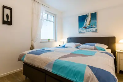 Ein Bett oder Betten in einem Zimmer der Unterkunft Käptn Knaak