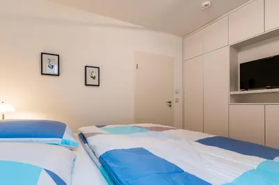 Ein Bett oder Betten in einem Zimmer der Unterkunft Käptn Knaak