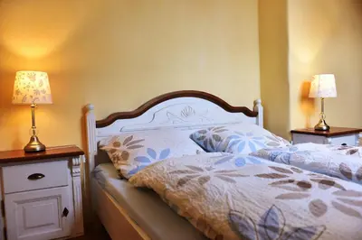 Ein Bett oder Betten in einem Zimmer der Unterkunft Haus Reuter 
